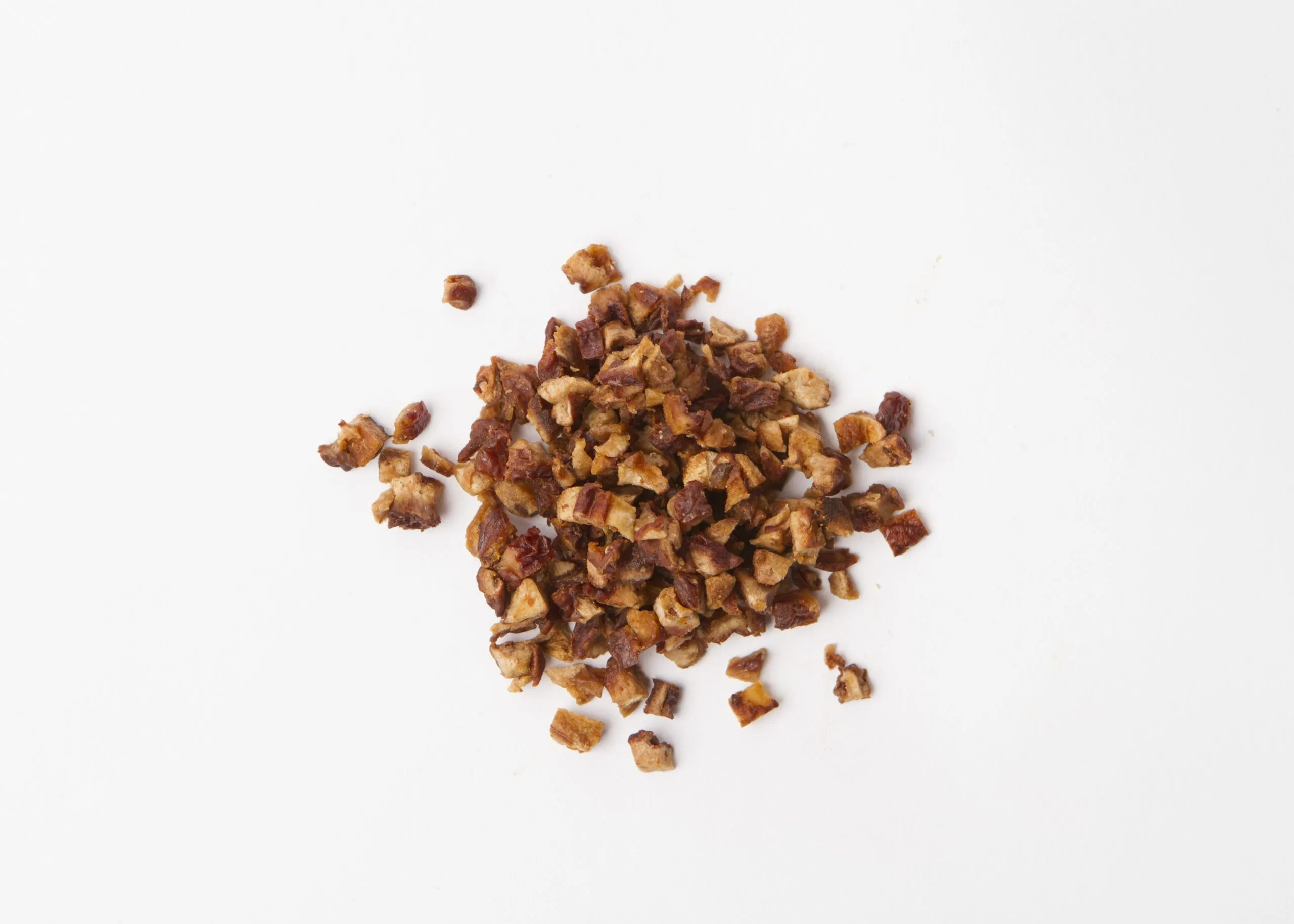 Traina® Natural Dried Pears, double-diced - small pile of sun dried fruit on white background.