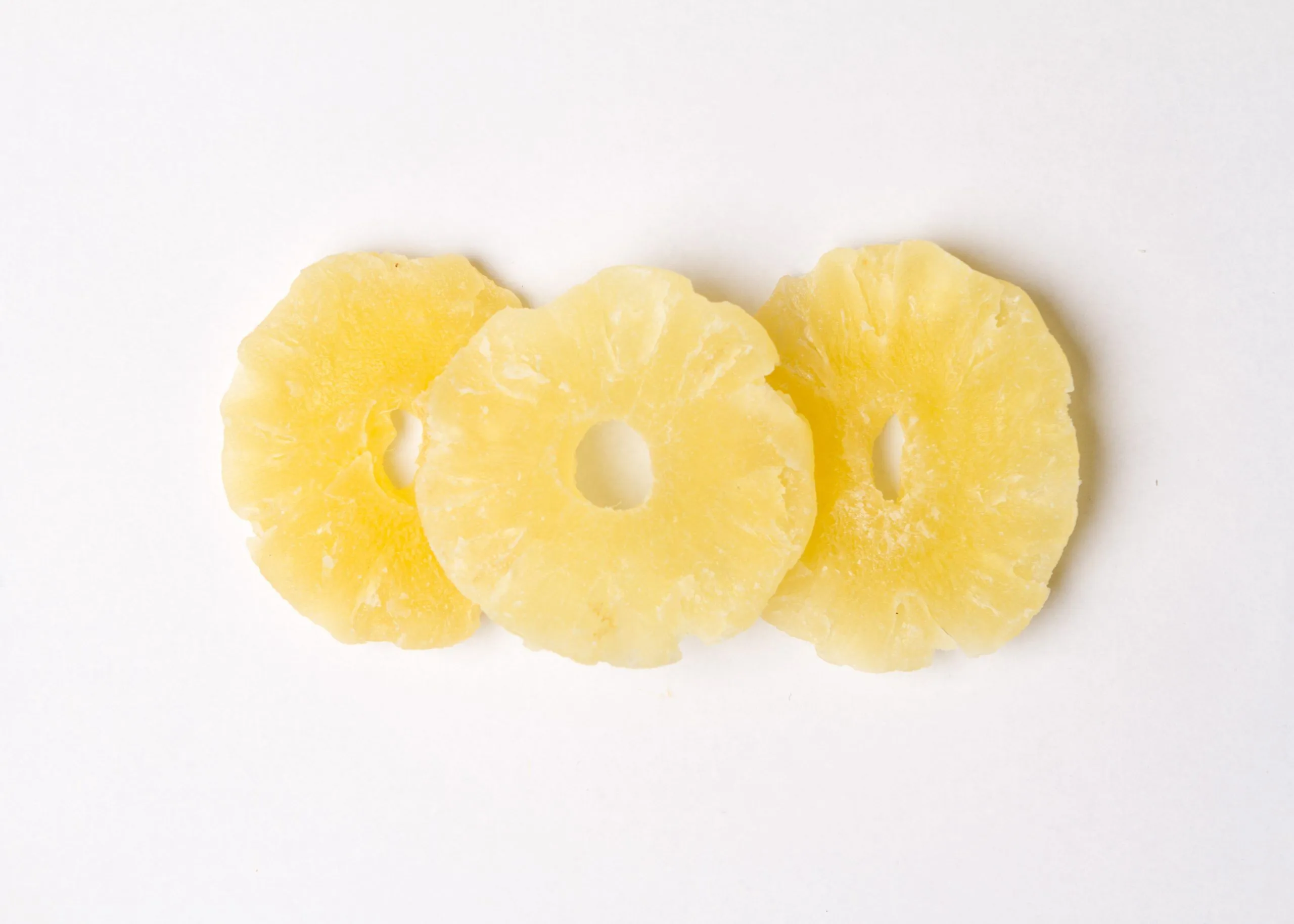 Bulk dried pineapple rings from Traina® Dried Fruit – tropical ingredient for foodservice and snack applications.