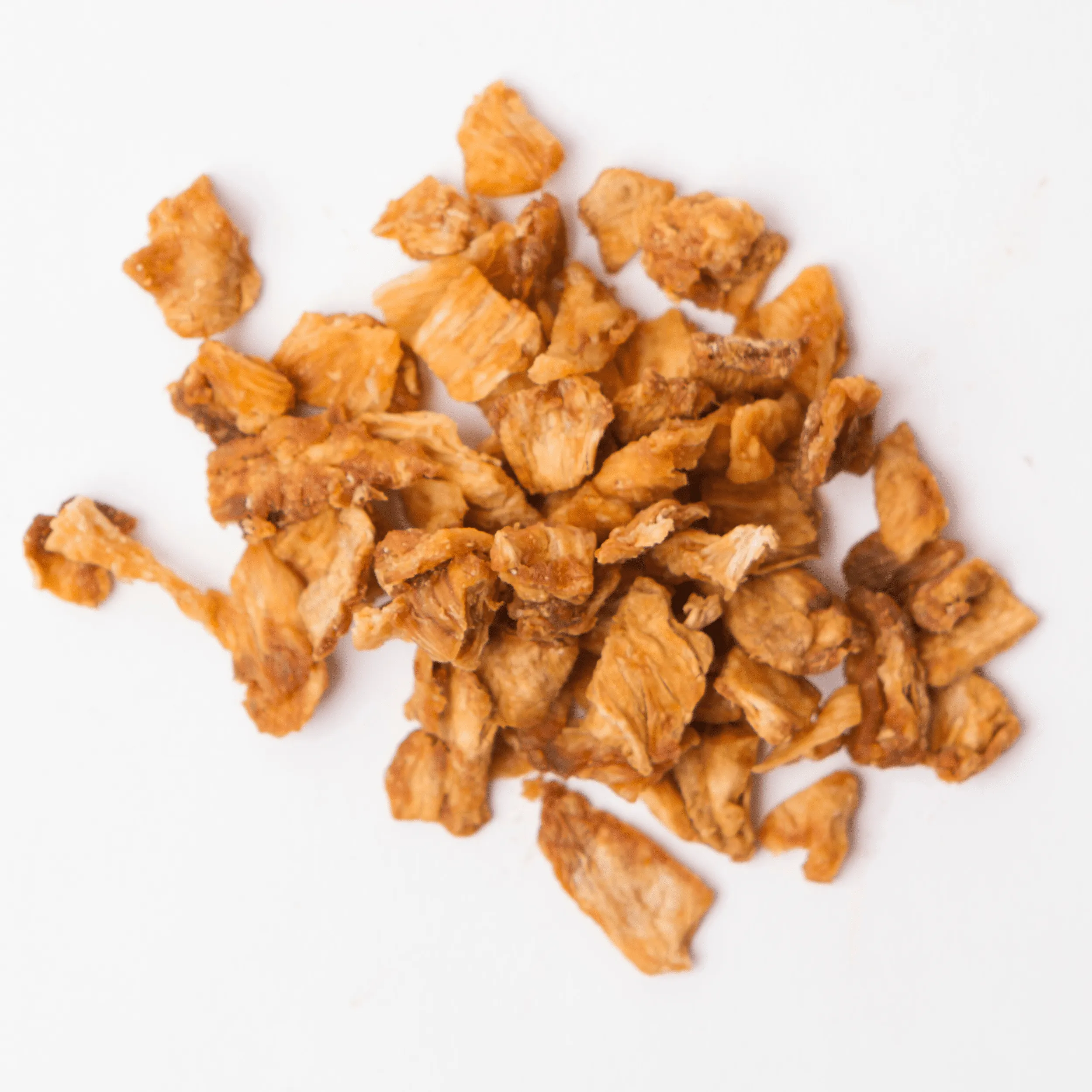 Traina® Dried Sweetened Pineapple without sulfur - Diced 8-10mm available in bulk sizes for Industrial Ingredient and Foodservice customers.