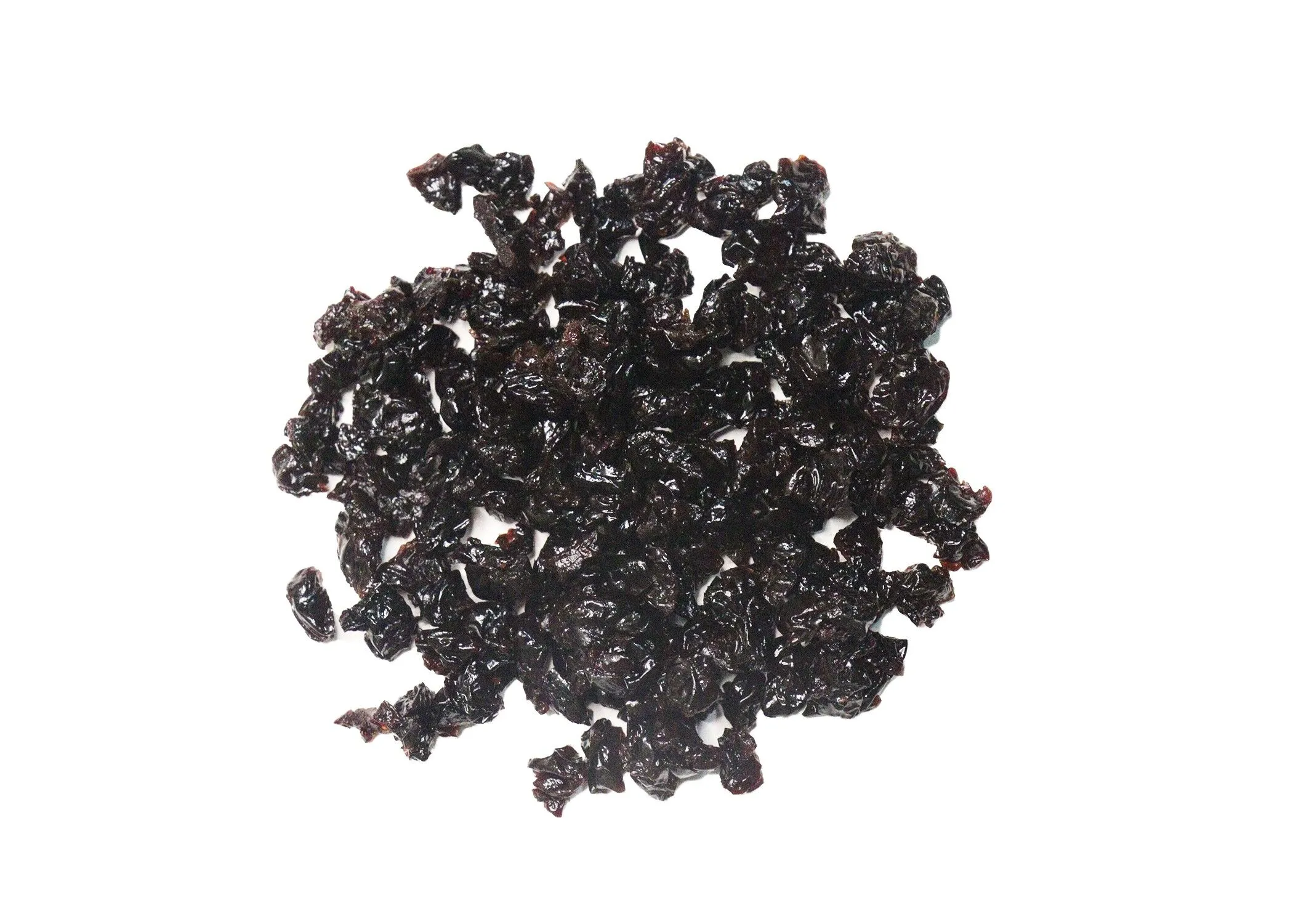 Traina® Dried Tart Sweetened Cherries, diced - small pile of sun dried fruit on white background.