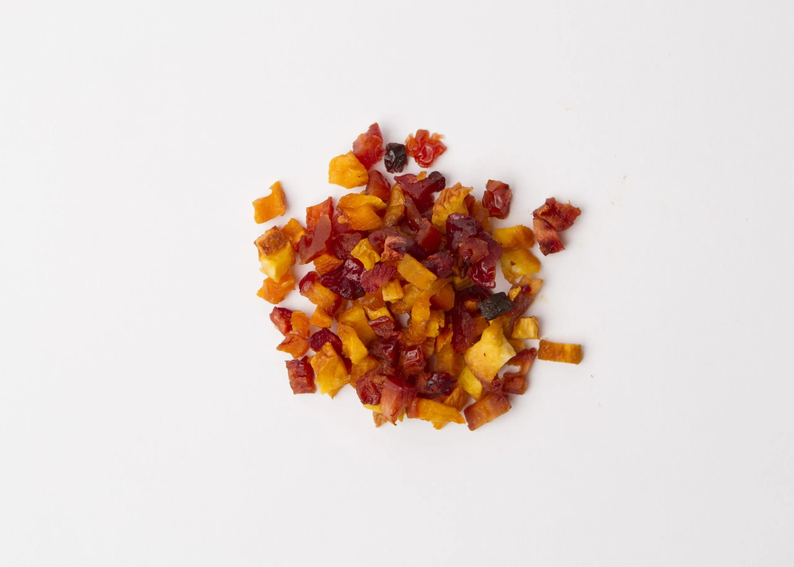 Traina® California Orchard Blend - small pile of mixed dried fruit on white background.