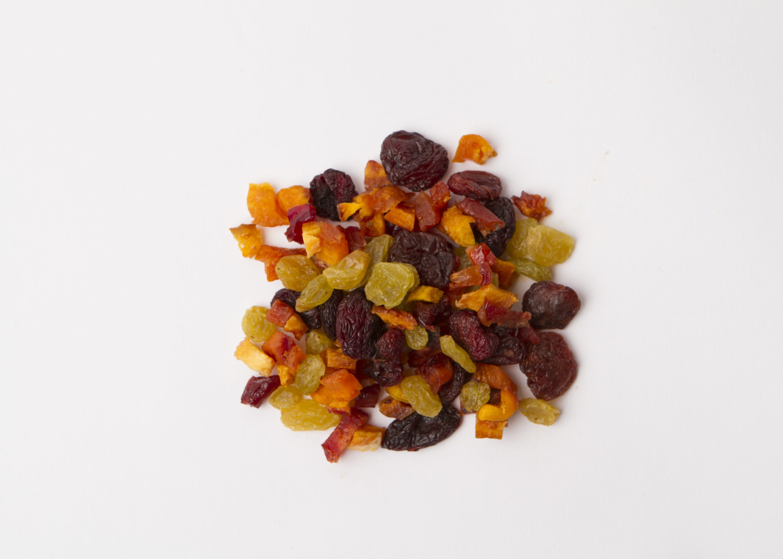 Traina® Valley Medley Blend - small pile of mixed dried fruit on white background.