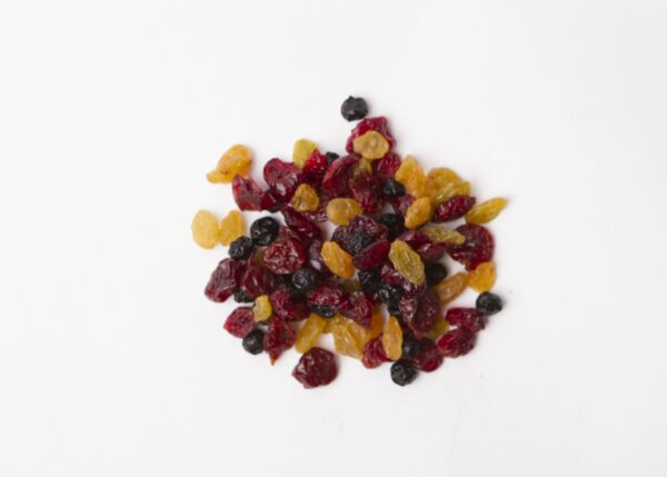 Traina® Berry Cherry Golden Fruit Blend - small pile of mixed dried fruit on white background.