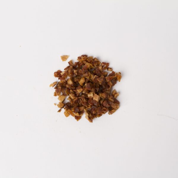 Traina® Organic Dried Pears, double-diced - small pile of sun dried fruit on white background.