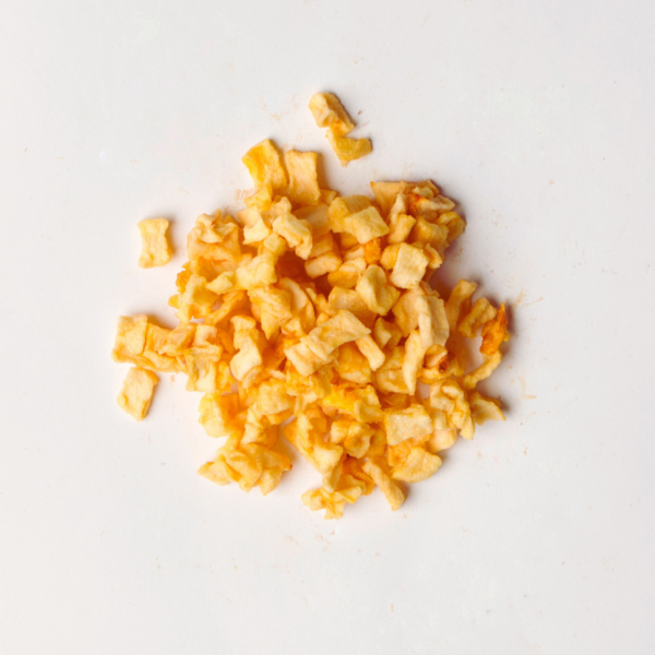 Traina® Dried Apples, diced, with sulfur- small pile of sun dried fruit on white background.