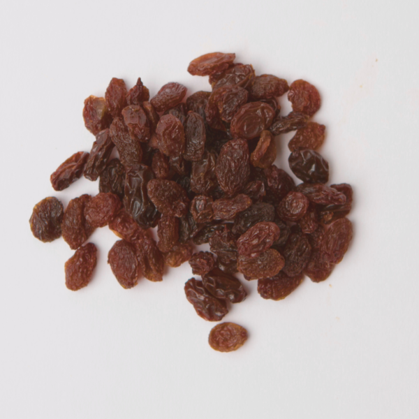 Traina® Dark Raisins, whole- small pile of dried fruit on white background