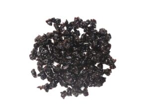 Traina® Dried Tart Cherries, sweetened, diced - small pile of sun dried fruit on white background.