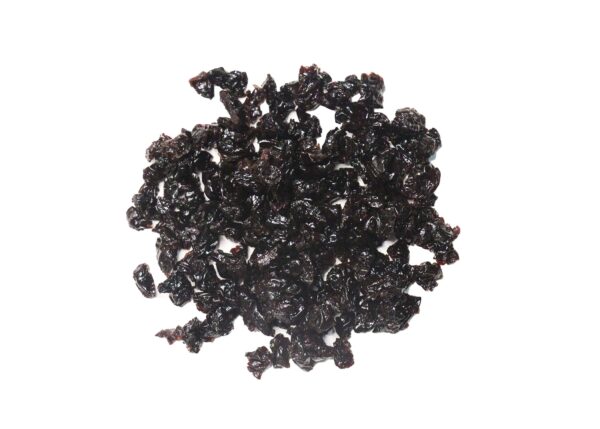 Traina® Dried Tart Cherries, sweetened, diced - small pile of sun dried fruit on white background.
